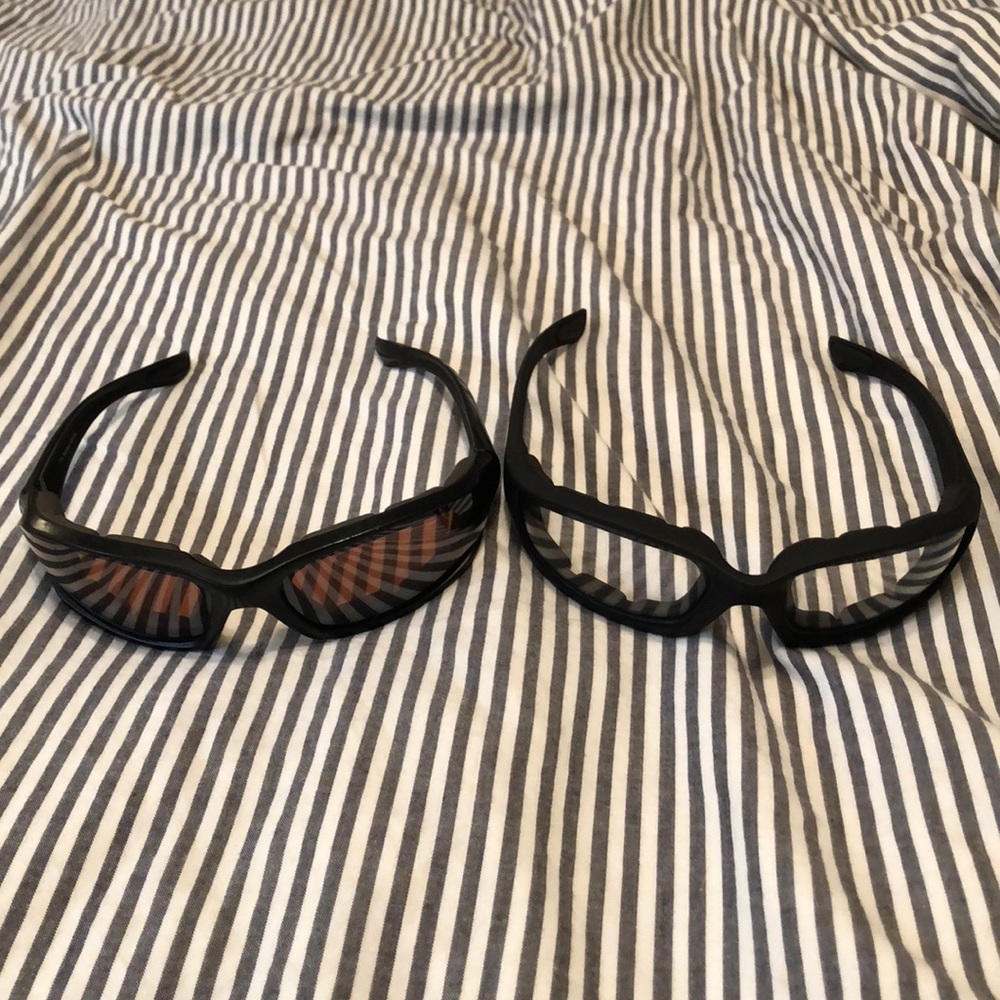 Two pairs of foam padded motorcycle glasses